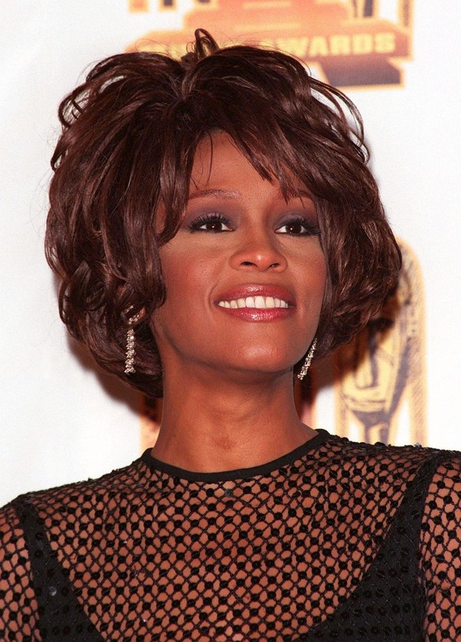 V javnosti nasmejana, v sebi pa se je Whitney borila z odvisnostjo. FOTO: Featureflash Photo Agency/Shutterstock
