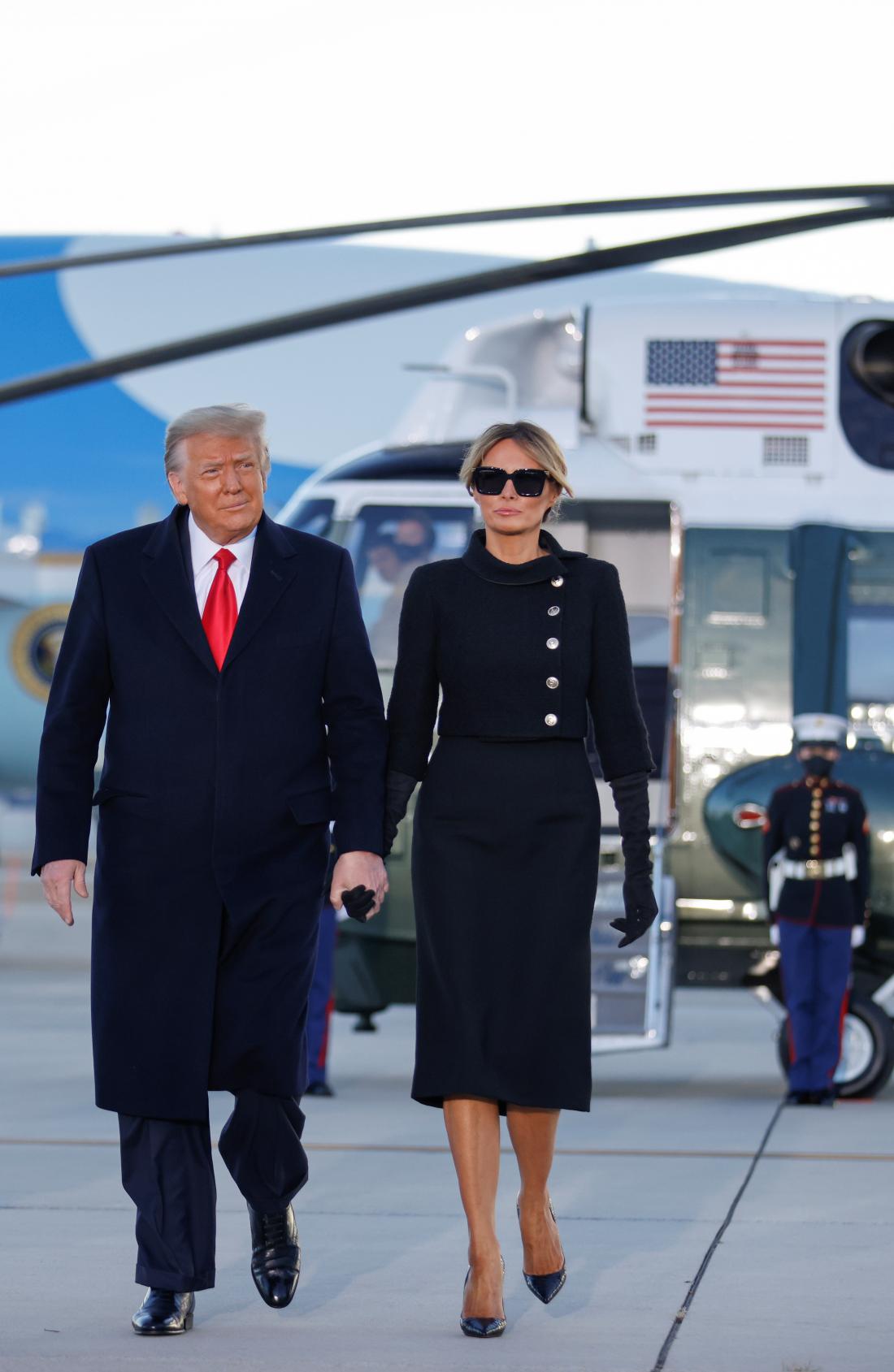 Donald in Melania Trump se Bidnove inavguracije nista udeležila, ampak sta pobegnila na Florido. Foto: Carlos Barria/Reuters